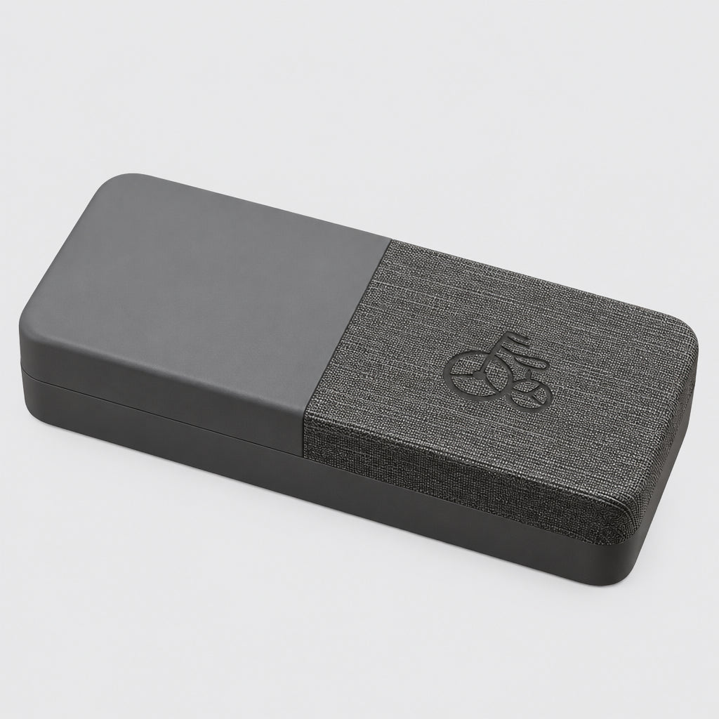 Gray yoga block with a textured surface on a beige background