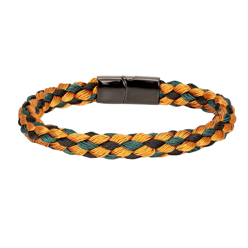 Braided bracelet with orange, green, and black colors on a white background