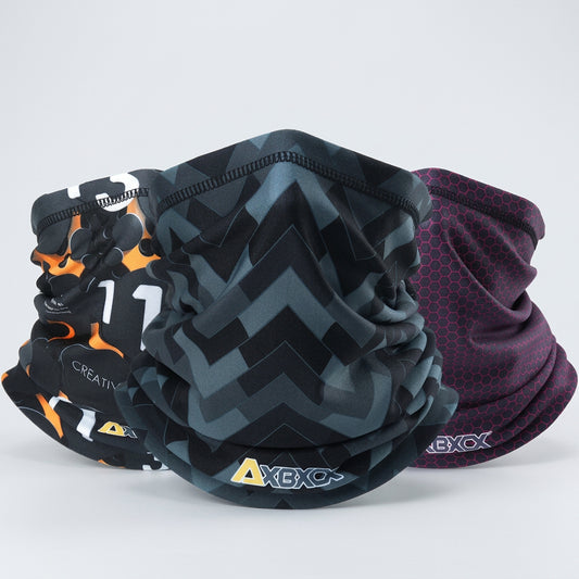 Four patterned neck gaiters with visible brand logos on a white background
