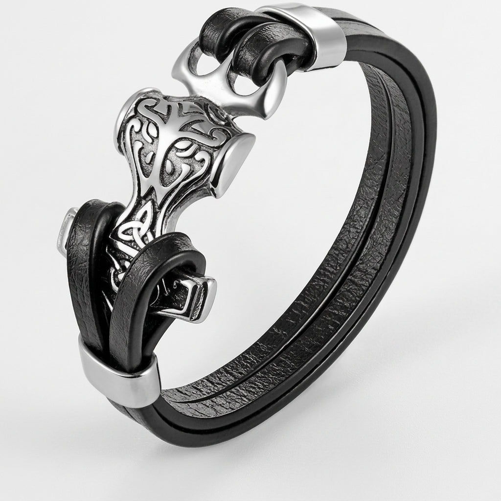Black leather bracelet with silver clasp on a white background