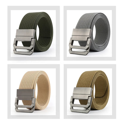 Four different colored belts with silver buckles on a white background