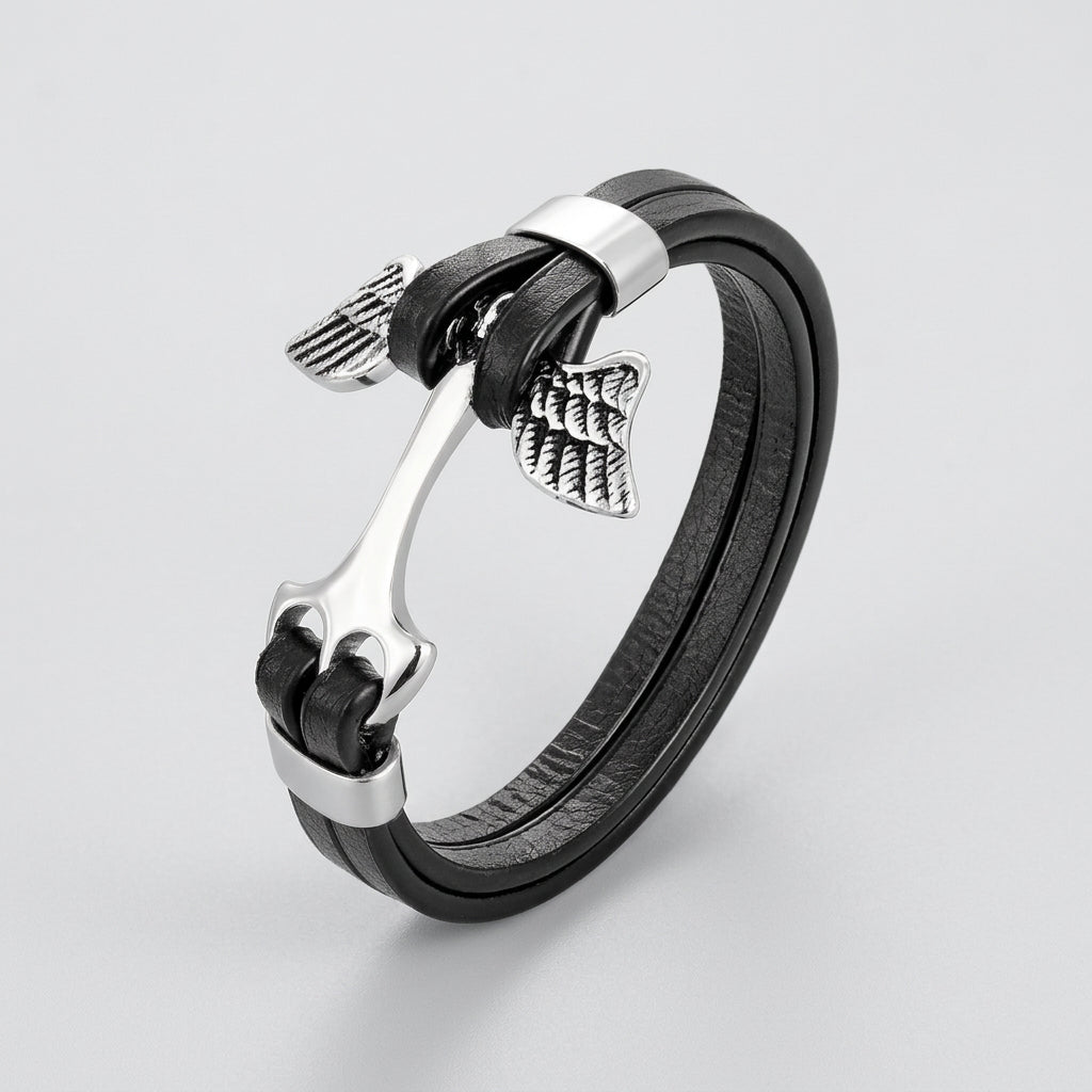Black leather bracelet with silver metal elements on a white background
