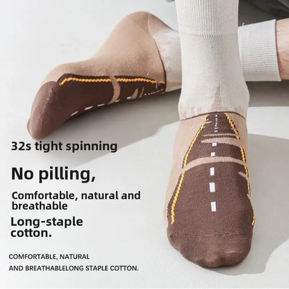 Brown socks with road design on a white background, featuring text about comfort and material.