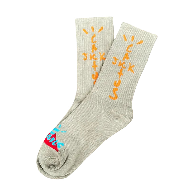 Light gray crew socks with orange cross-shaped lettering and colorful toe graphics, overlapping view