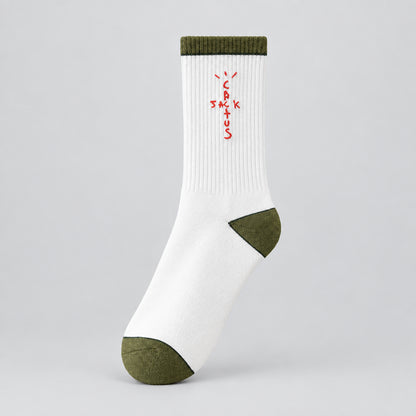 White crew sock with red cross-shaped lettering and olive cuff, heel, and toe, angled view