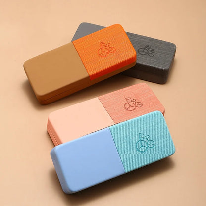 Colorful rectangular blocks with a brand logo on a beige background