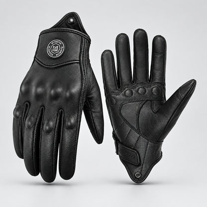 Black gloves shown from the palm and back, with stitched palm panels and wrist straps.
