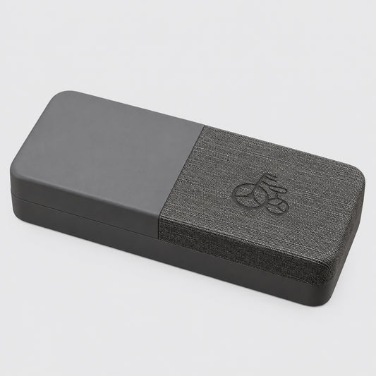 Gray yoga block with a textured surface on a beige background