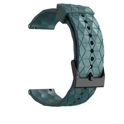 Teal silicone band shown open with geometric texture, buckle and adjustment holes.
