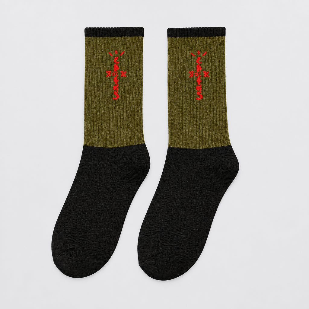 Olive and black crew socks with red cross-shaped lettering and black cuffs, angled view