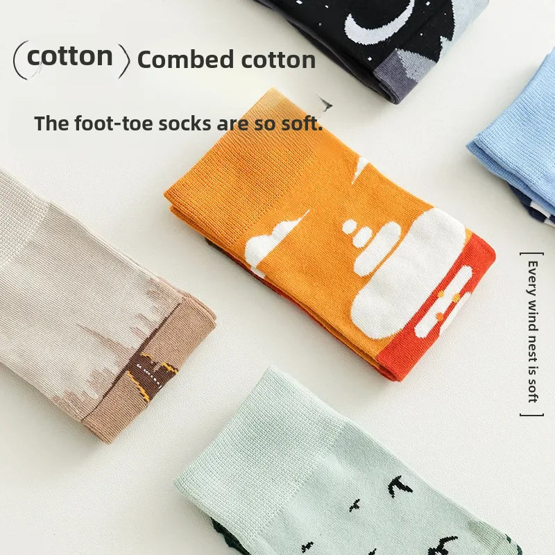 Collection of various socks with different designs on a light background