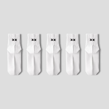 Five white socks with black X marks on a light gray background