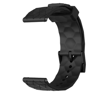 Black silicone watch band showing its geometric outer texture, inner surface and buckle.