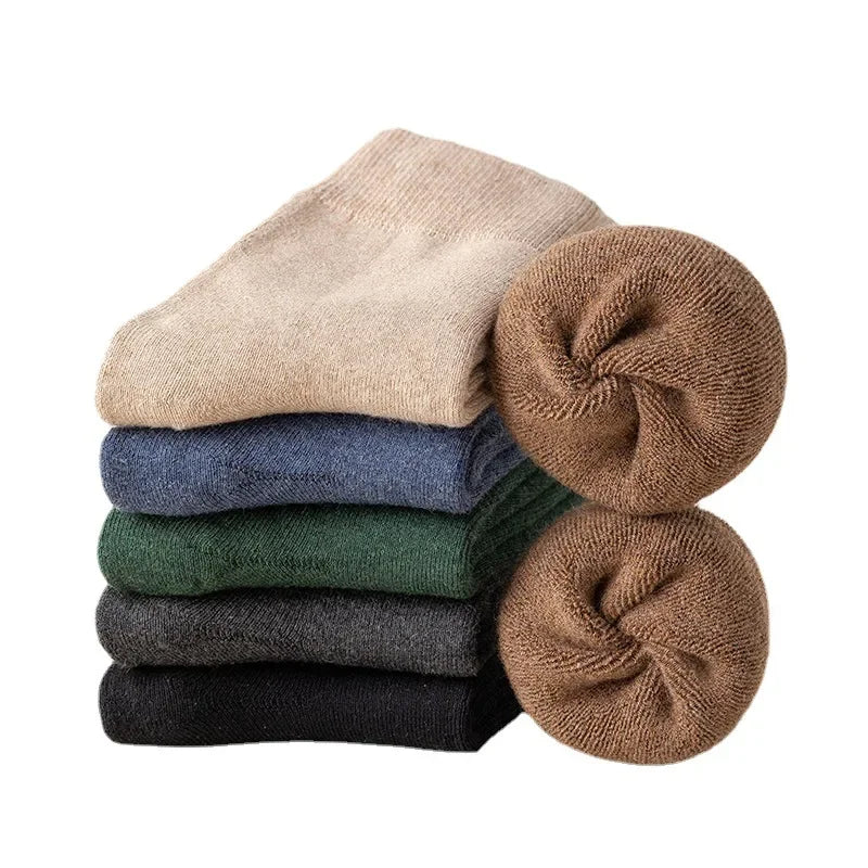 Stack of colorful socks on a white background
